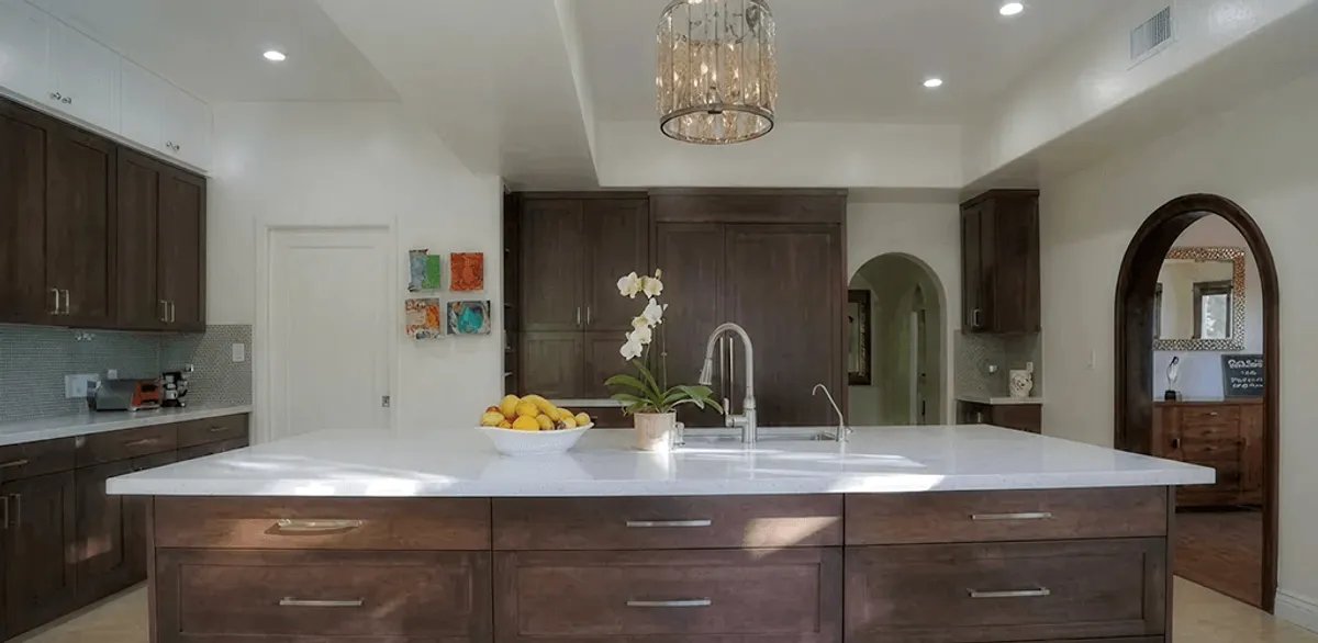 Cabinet refacing project with updated kitchen cabinets and island in Glendale, AZ